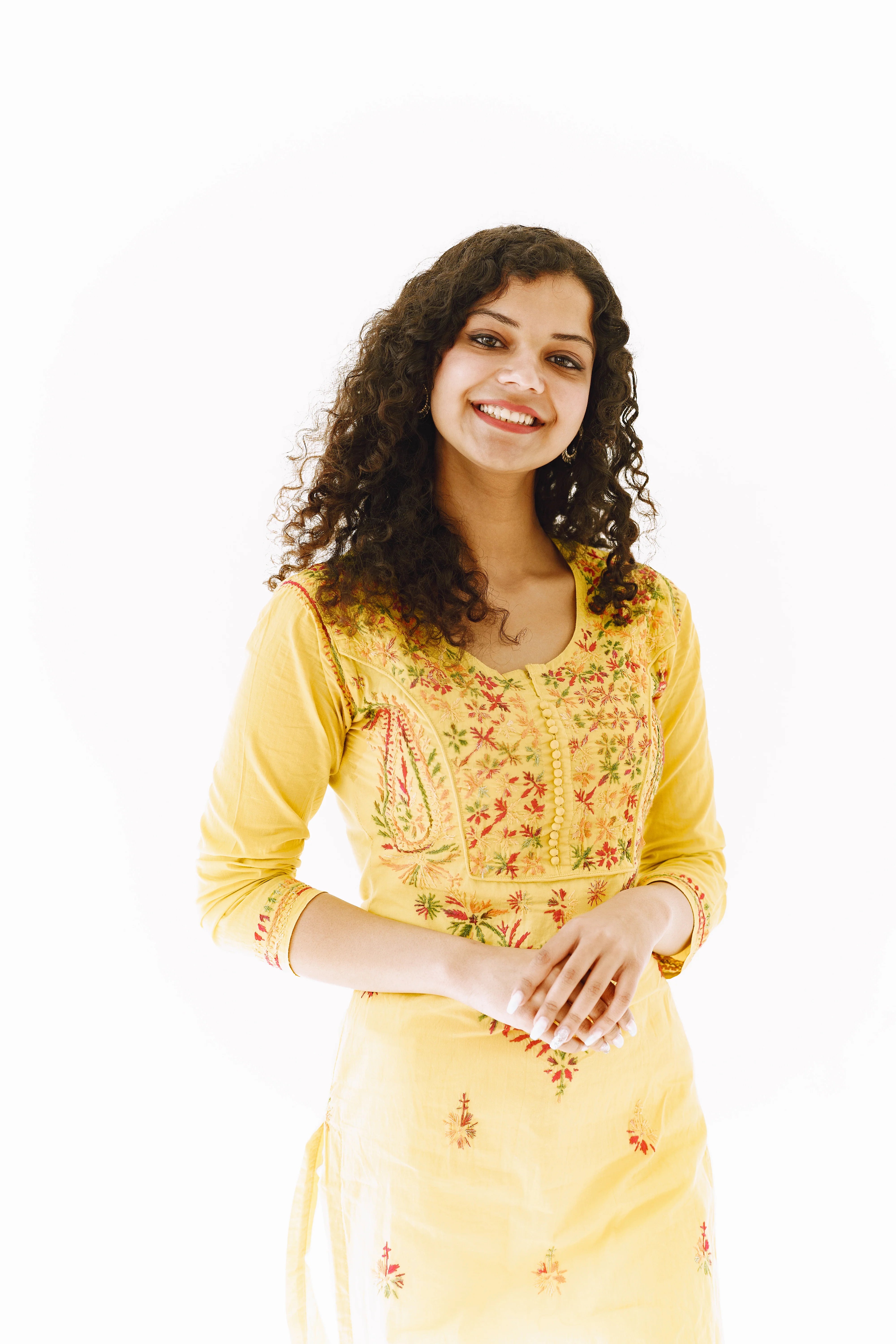 files/cheerful-traditional-indian-woman-white-background-studio-shot.webp